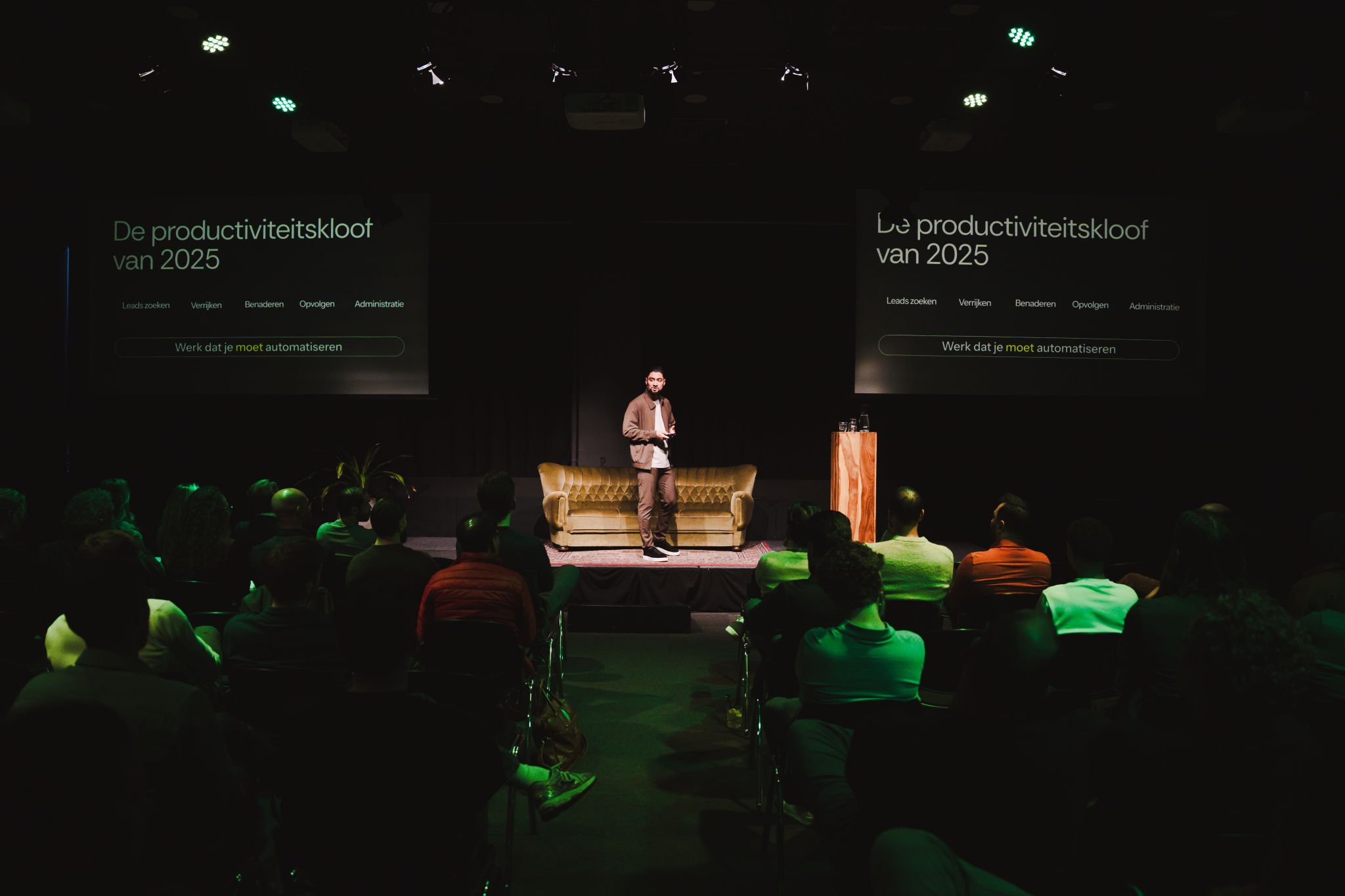 Re:Shark presenting on stage to an audience